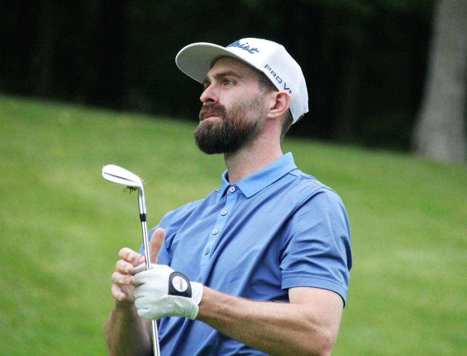 Patrick Wilkes-Krier watches a shot during Monday’s play at Grand Traverse Resort .