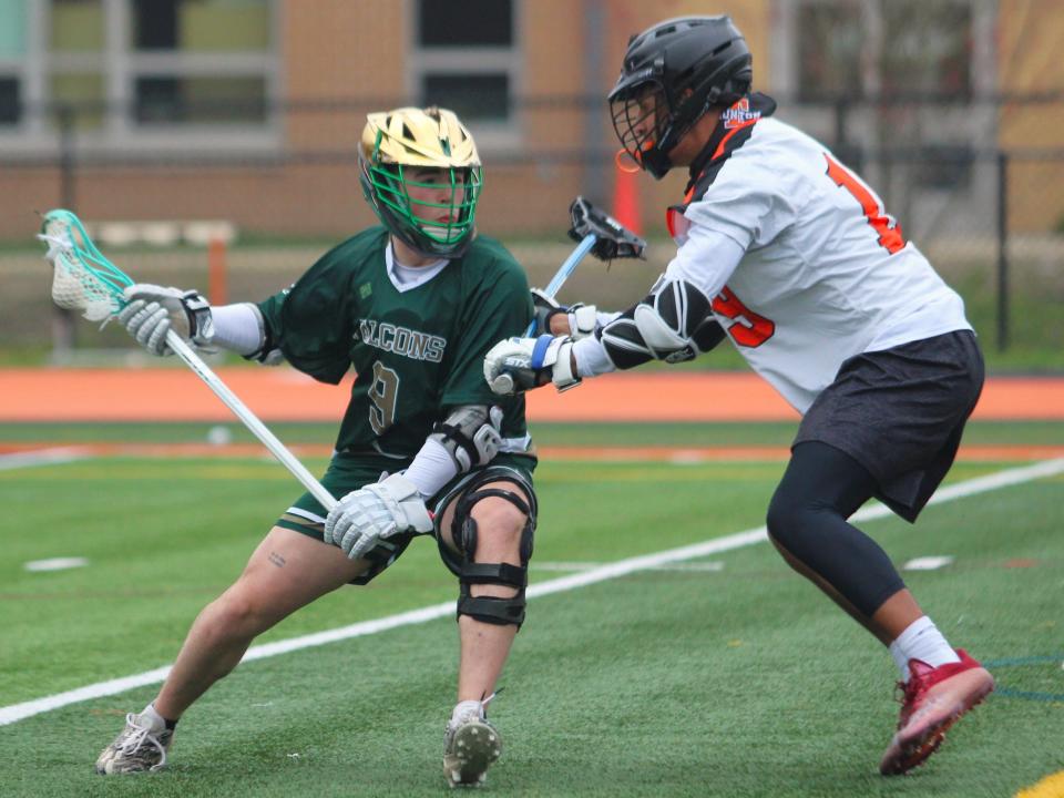 Dighton-Rehoboth's Jaiden Solitro looks to get past Taunton's Malakai Mchady during a non-league game.