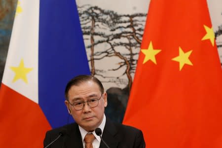 Philippine Foreign Secretary Teodoro Locsin Jr. attends a news conference after talks with Chinese Foreign Minister Wang Yi at the Diaoyutai State Guesthouse in Beijing