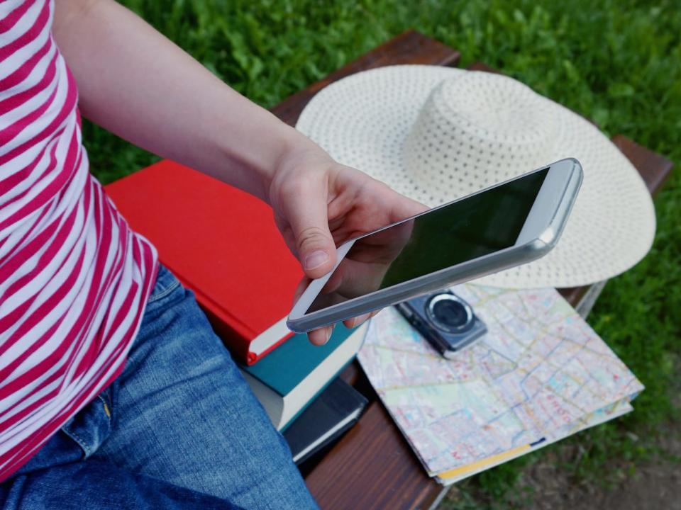 woman holding phone