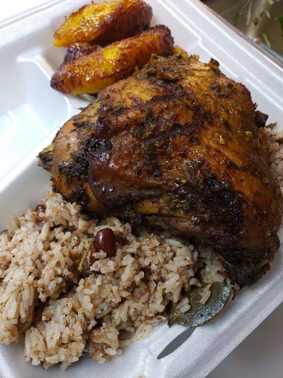 Soul Rebel restaurant's jerk chicken served with rice and peas and plantains.