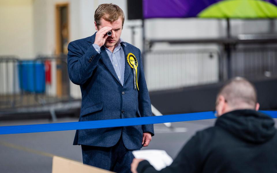 SNP candidate follows the count through a handheld microscope