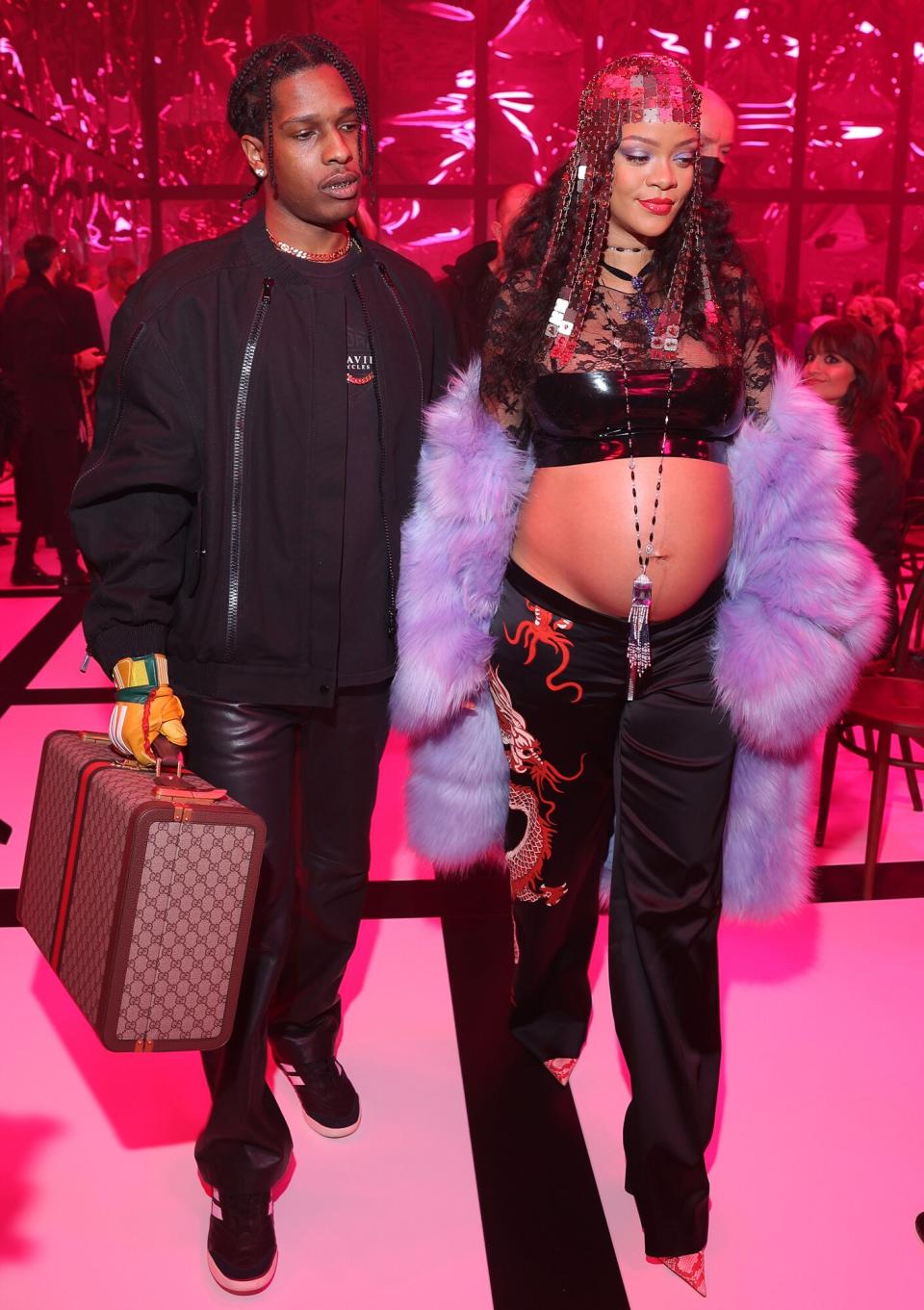 Asap Rocky and Rihanna are seen at the Gucci show during Milan Fashion Week Fall/Winter 2022/23 on February 25, 2022 in Milan, Italy