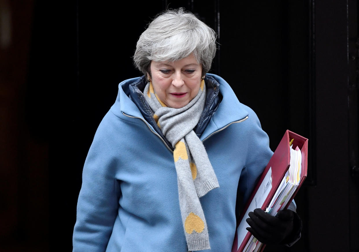 British Prime Minister Theresa May walks outside Downing Street in London, Britain March 13, 2019. REUTERS/Toby Melville