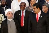 Venezuela's President Nicolas Maduro (R), Iranian President Hassan Rouhani (L) and other presidents, leaders and head of delegations pose for a family photo during the 17th Non-Aligned Summit in Porlamar, Venezuela September 17, 2016. REUTERS/Marco Bello