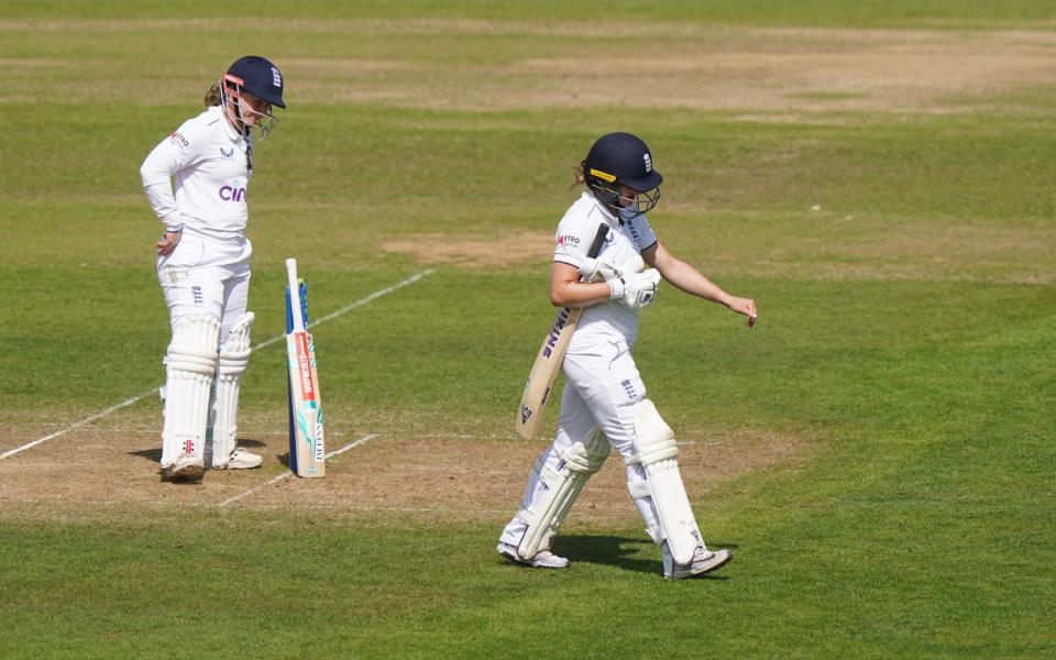 Emma Lamb walks off after being dismissed cheaply at Trent Bridge.