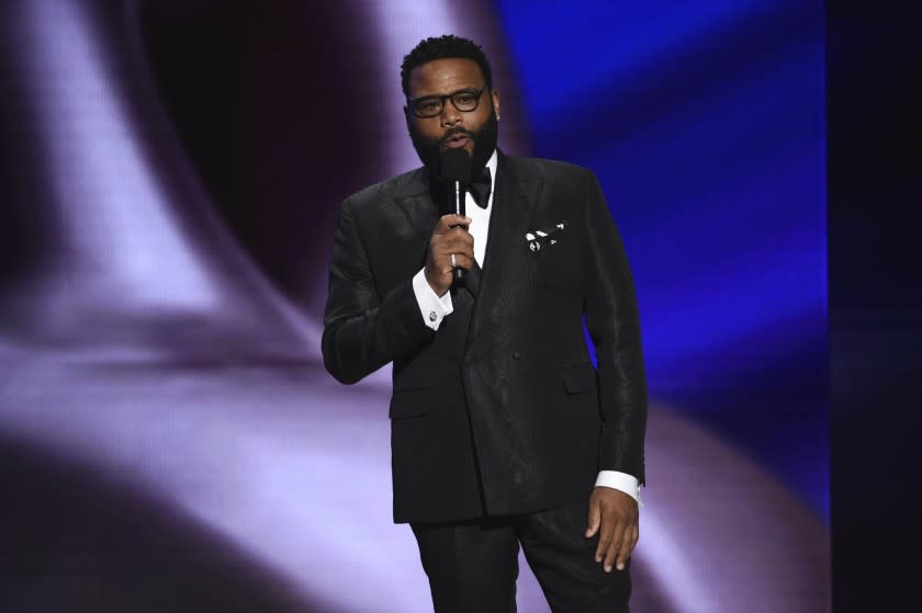 Host Anthony Anderson speaks onstage at the 51st NAACP Image Awards at the Pasadena Civic Auditorium on Saturday, Feb. 22, 2020, in Pasadena, Calif. (AP Photo/Chris Pizzello)