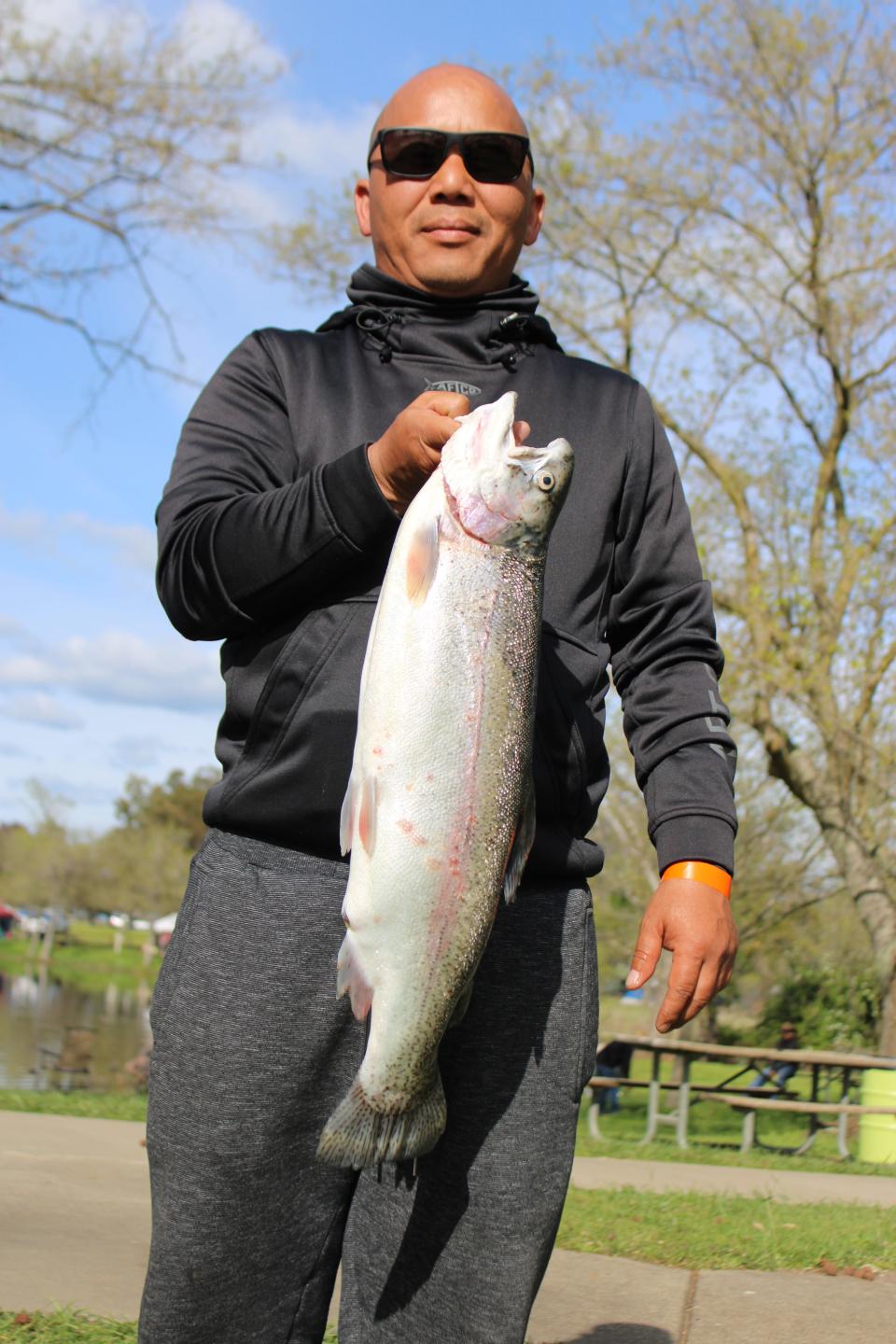 Ka Her won first place in the adult division of the SMUD Rancho Seco Trout Derby on April 6 with this 7.36 pound rainbow trout.