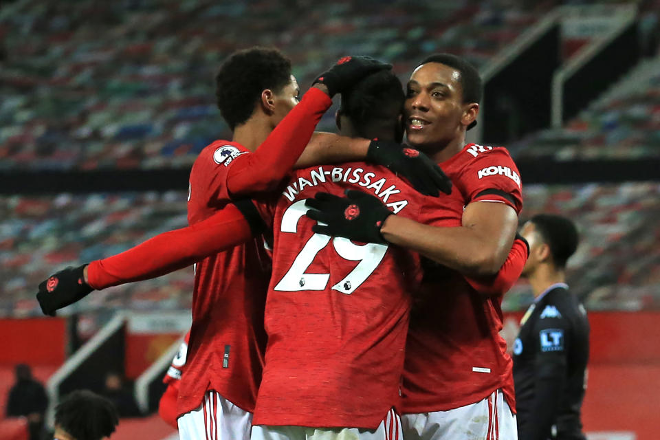 Manchester United striker Anthony Martial (right) celebrates with teammates after scoring the opening goal against Aston Villa.
