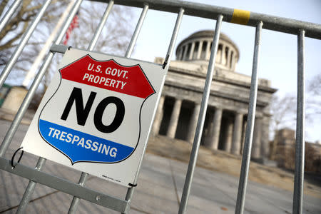 A sign is seen on a fence at the General Grant National Memorial, for former U.S. President Ulysses S. Grant, as the partial U.S. government shutdown continues, in Manhattan, New York City, New York, U.S., January 7, 2019. REUTERS/Mike Segar