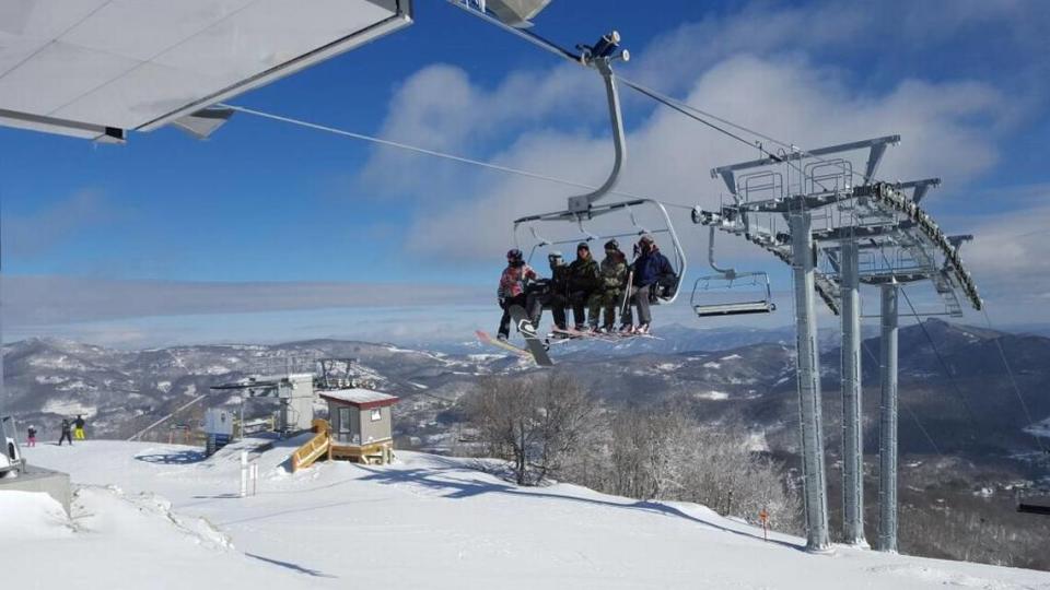 Skiers ride the lift at Sugar Mountain Resort, located about 35 minutes outside of Boone, NC.