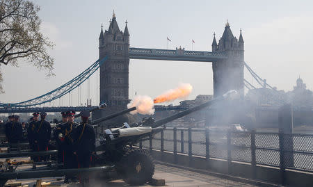 Members of the Honourable Artillery Company fire a 62-gun salute across the River Thames to mark the 92nd birthday of Britain's Queen Elizabeth, at the Tower of London, Britain April 21, 2018. REUTERS/Henry Nicholls