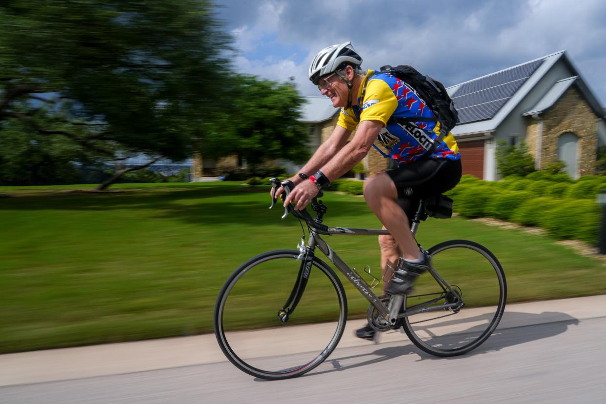 Frank Brewer, 71, rides his bike through his Leander neighborhood earlier this month. In October, Brewer suffered a heart attack despite not having classic symptoms. His wife helped save his life by inquiring about an EKG when he went to the emergency room for possible dehydration.