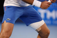 Novak Djokovic of Serbia waits to receive a serve from Tommy Paul of the U.S. during their semifinal at the Australian Open tennis championship in Melbourne, Australia, Friday, Jan. 27, 2023. (AP Photo/Asanka Brendon Ratnayake)