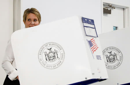 Democratic candidate for governor, Cynthia Nixon looks up as she cast her vote in the New York State Democratic primary in New York City, U.S., September 13, 2018. REUTERS/Brendan McDermid