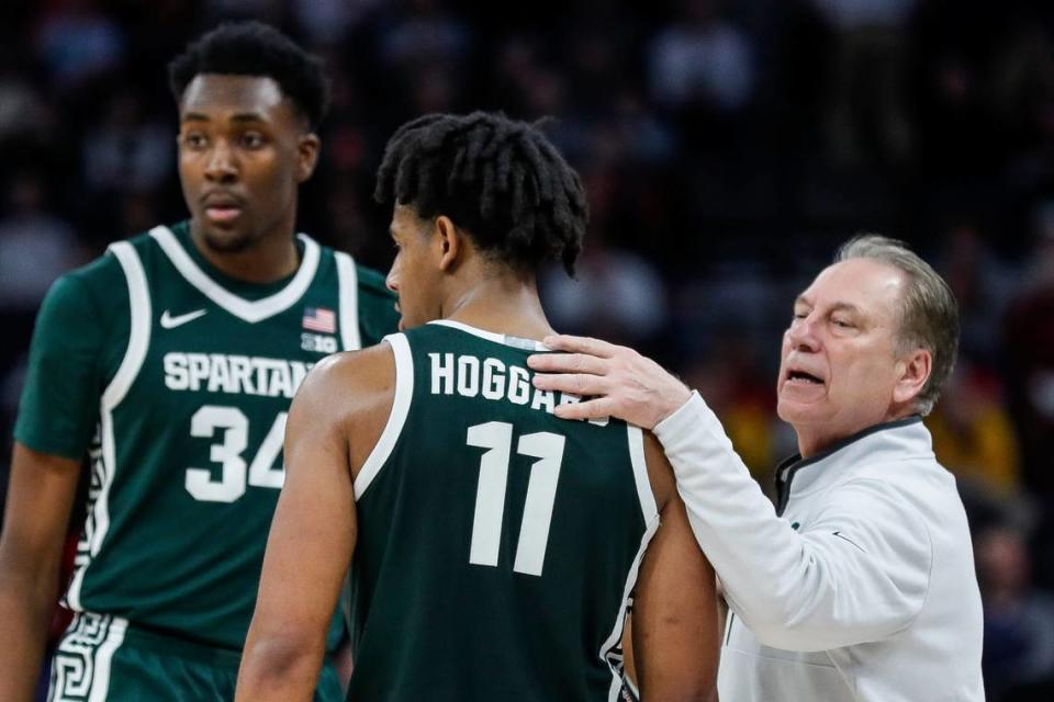Michigan State head coach Tom Izzo talks to forward Xavier Booker (34) and guard A.J. Hoggard (11) during the second half of a quarterfinal at the Big Ten Tournament at Target Center in Minneapolis, Minn. on Friday, March 15, 2024.