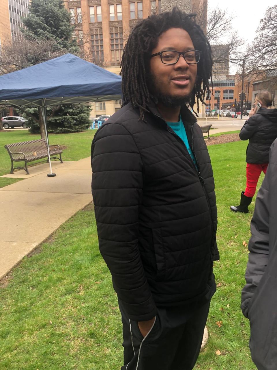 Xavier Thomas attends a Red Arrow Park event in support of the Dontre Hamilton family on Saturday. The city of Milwaukee unveiled a new memorial for Hamilton, which his family hopes can help make Milwaukee a better, more just city.