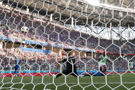 Soccer Football - World Cup - Group D - Nigeria vs Iceland - Volgograd Arena, Volgograd, Russia - June 22, 2018 Nigeria's Ahmed Musa scores their first goal REUTERS/Toru Hanai