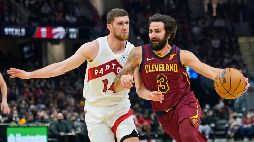 Cavaliers guard Ricky Rubio (3) drives past Toronto Raptors forward Svi Mykhailiuk (14) in the first half of the Cavs' 144-99 win Sunday night in Cleveland. [Tony Dejak/Associated Press]