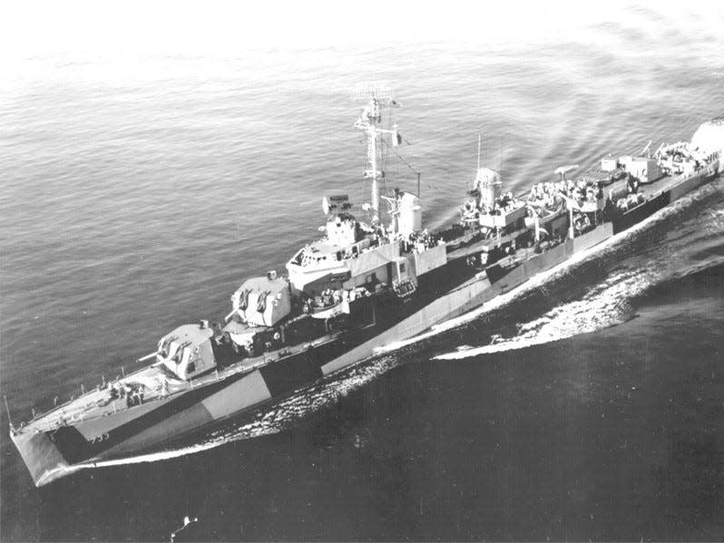 A old black and white photo of the USS Mannert L. Abele.