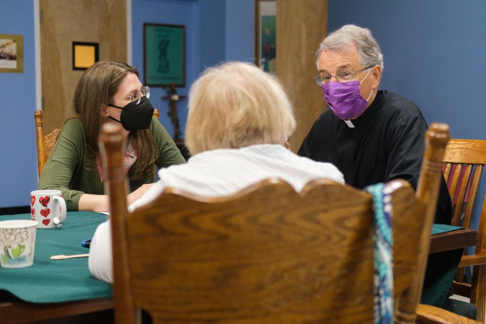 The Rev. Val Handwerker listens to members of St. Patrick's Catholic Church during their meeting, Sunday, March 6, 2022, in Memphis.