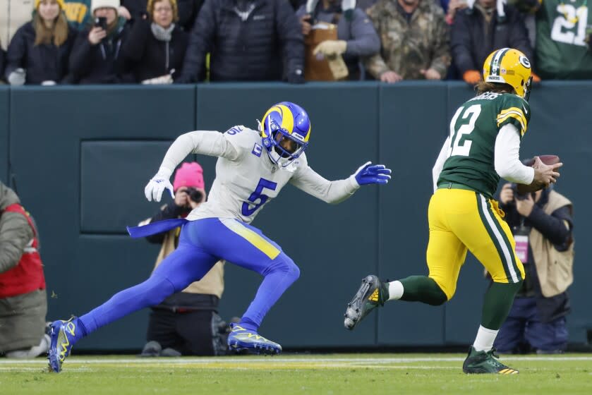 Los Angeles Rams cornerback Jalen Ramsey (5) defends during an NFL football game against the Green Bay Packers Sunday, Nov 28. 2021, in Green Bay, Wis. (AP Photo/Jeffrey Phelps)