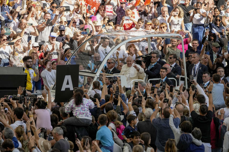 Pope Francis arrives at the "Velodrome Stadium", in Marseille, France, to celebrate mass, Saturday, Sept. 23, 2023. Francis, during a two-day visit, will join Catholic bishops from the Mediterranean region on discussions that will largely focus on migration. (AP Photo/Alessandra Tarantino)