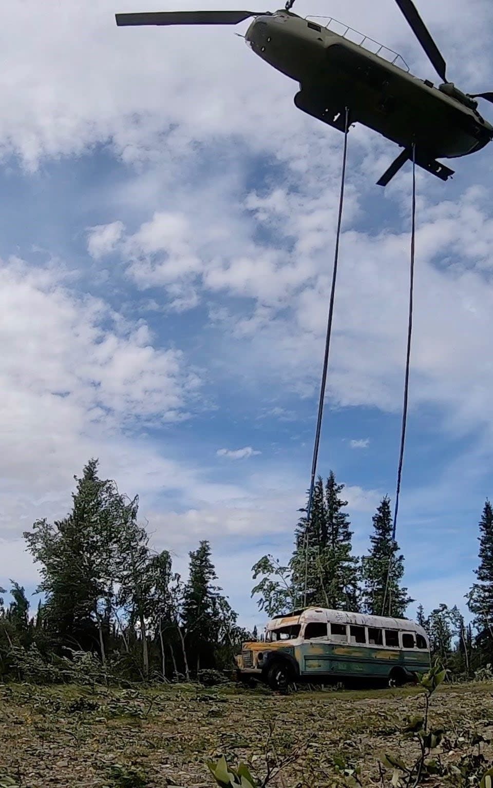 The 'Into the Wild' bus is removed by the Alaskan National Guard - SETH LACOUNT/AFP