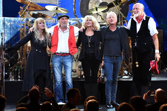 Dia Dipasupil/Getty Stevie Nicks, John McVie, Christine McVie, Lindsey Buckingham and Mick Fleetwood of Fleetwood Mac onstage at Radio City Music Hall in January 2018 in New York City