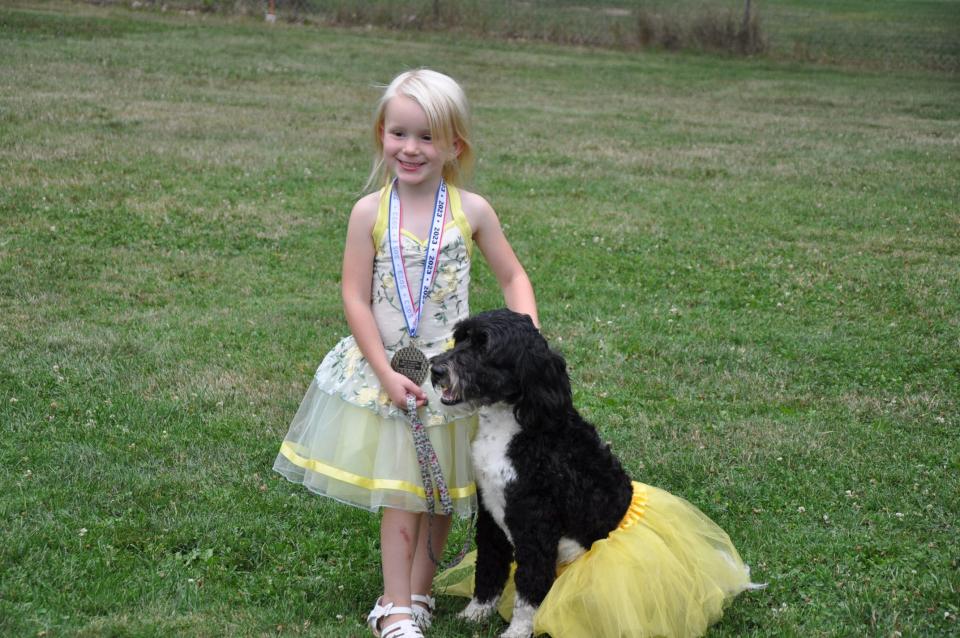 Anna Reinsel, 4, and her dog, Lola, won Best in Show at the 2023 Greater Alliance Carnation Festival Pet Show on Friday, Aug. 11, 2023, at Silver Park in Alliance.