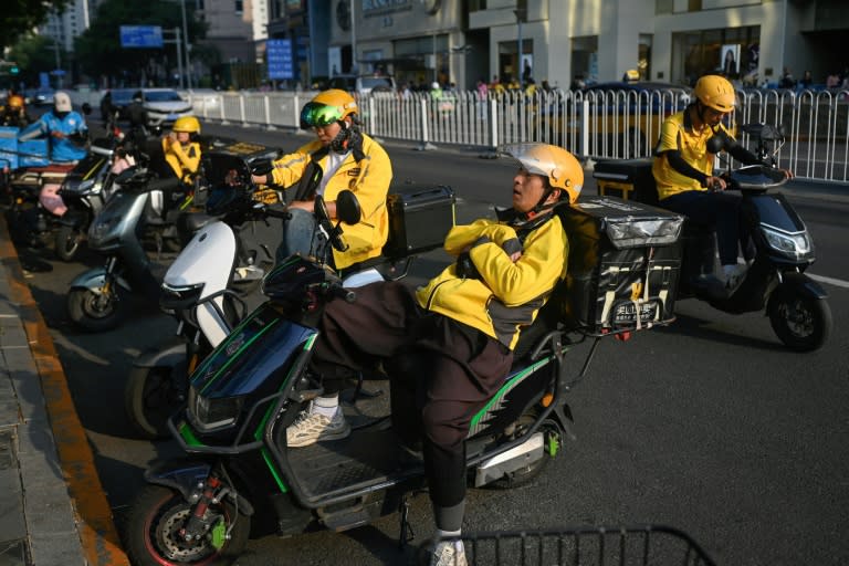 China's economy, the world's second largest, is grappling with headwinds from a prolonged housing crisis to sluggish consumption (WANG Zhao)