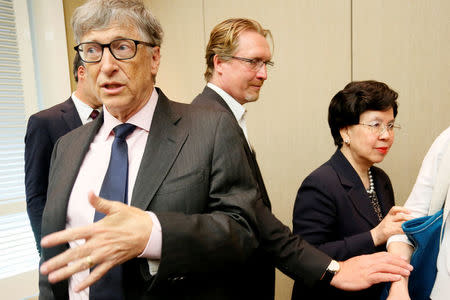 Bill Gates (L), co-founder of the Bill & Melinda Gates Foundation, and World Health Organization (WHO) Director-General Margaret Chan (R) after a news conference on neglected tropical diseases (NTDs) in Geneva, Switzerland, April 18, 2017. REUTERS/Pierre Albouy