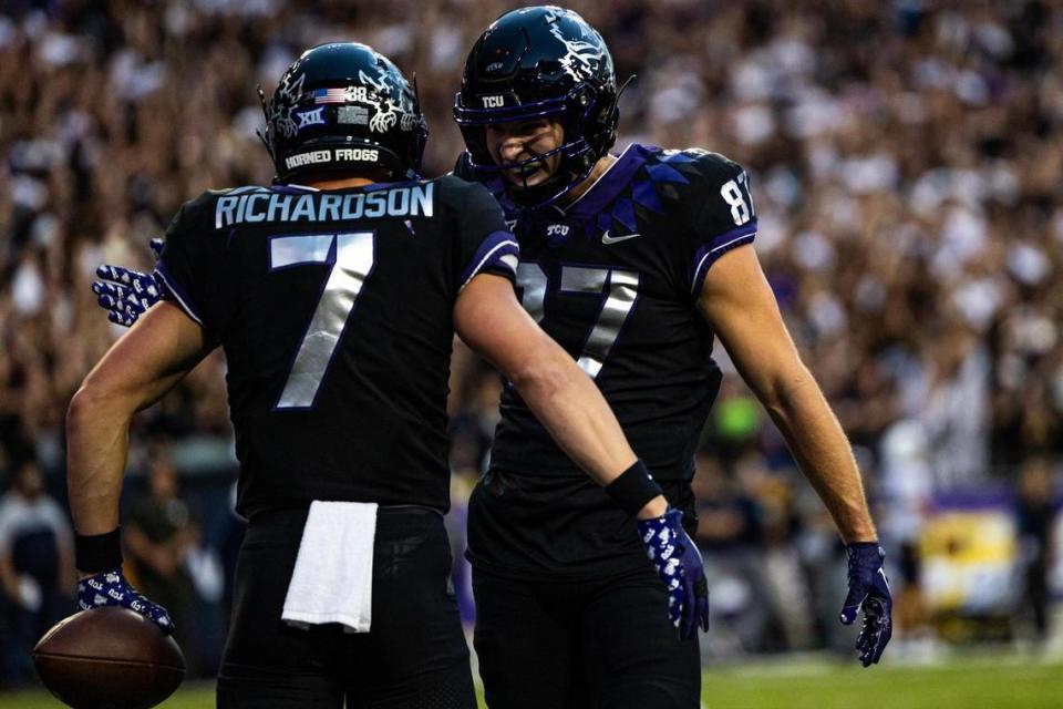 TCU wide receiver JP Richardson (7) celebrates with his teammate Blake Nowell (87 after scoring a touchdown in the first quarter of a Big XII conference game between the TCU Horned Frogs and the West Virginia Mountaineers at Amon G. Carter Stadium in Fort Worth on Saturday, Sept. 30, 2023. Chris Torres/ctorres@star-telegram.com