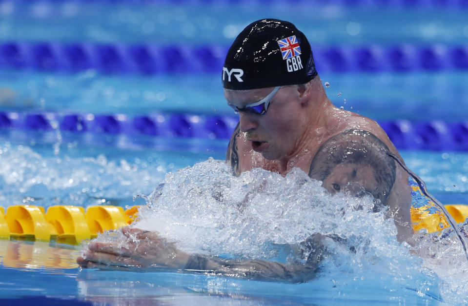 Britain's Adam Peaty competes to win the men's 50 meters breaststroke finals at the European Aquatics Championships in Duna Arena in Budapest, Hungary, Saturday, May 22, 2021. (AP Photo/Petr David Josek)