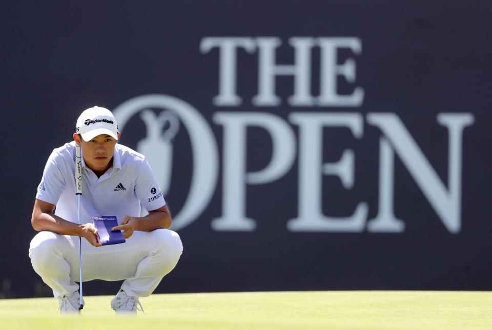 Collin Morikawa lines up a putt on the 18th green (PA Wire)