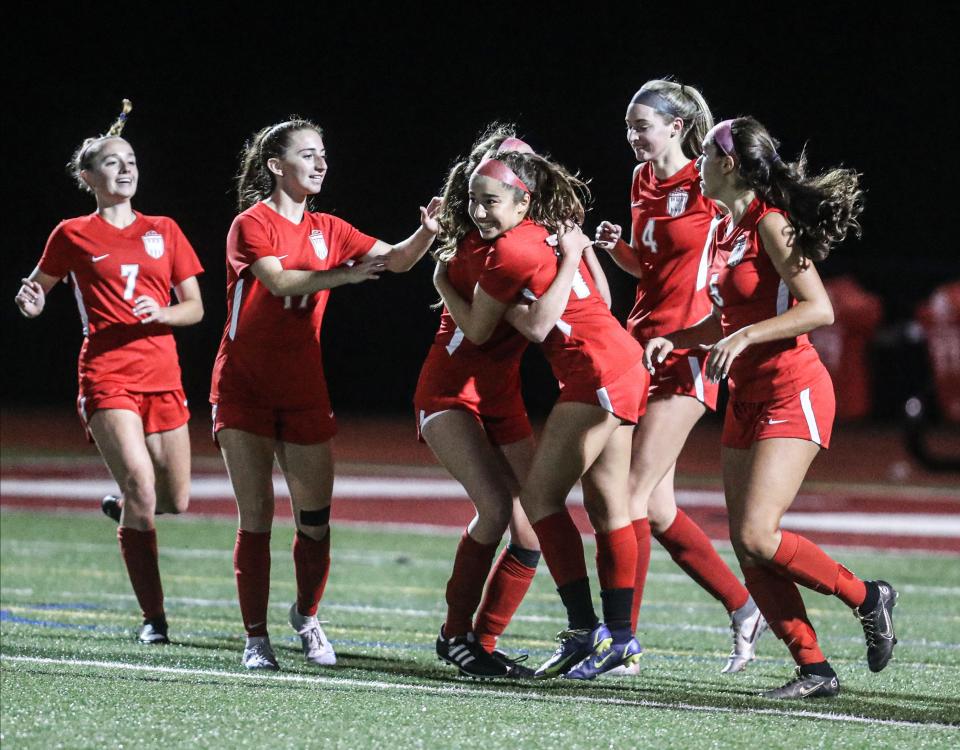 Julia Arbelaez of Somers is congratulated by teammates after her first-half goal during a varsity soccer game against Rye at Somers High School Oct. 6, 2022. Somers defeated Rye 3-0.