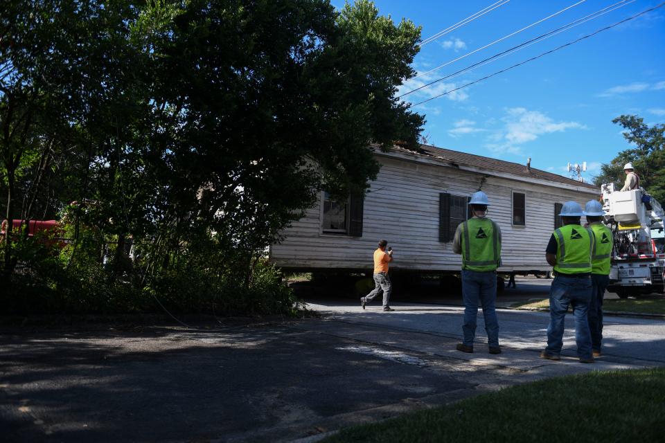 The historic Fordyce-Kennedy-Pritchard House is moved across Arsenal Avenue on it's way to East Avenue on Thursday, Sept. 7, 2023.