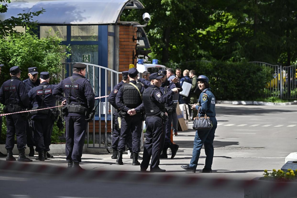 Russian security forces take measures near a damaged site following a drone strike on May 30, 2023. <a href="https://media.gettyimages.com/id/1258281328/photo/drone-attack-in-moscow-damages-several-buildings-with-no-casualties.jpg?s=1024x1024&w=gi&k=20&c=fFRqMsFBSdxa7qh4flT00Xviw-RiQwO4Yhrtho9x0LE=" rel="nofollow noopener" target="_blank" data-ylk="slk:Sefa Karacan/Anadolu Agency via Getty Images;elm:context_link;itc:0;sec:content-canvas" class="link ">Sefa Karacan/Anadolu Agency via Getty Images </a>