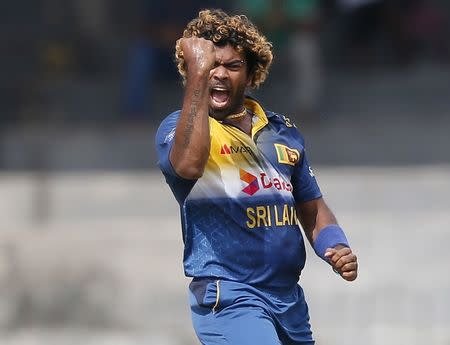 FILE PHOTO - Sri Lanka's Lasith Malinga celebrates after taking the wicket of West Indies' Andre Fletcher (not pictured) during their second One Day International cricket match in Colombo November 4, 2015. REUTERS/Dinuka Liyanawatte