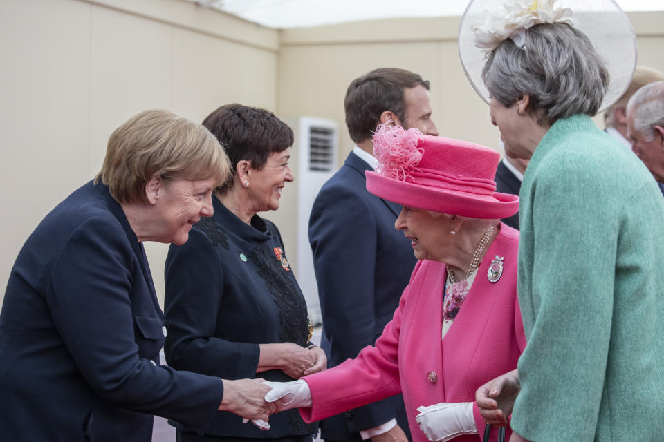 (left to right) German Chancellor Angela Merkel, Queen Elizabeth II and Prime Minister Theresa May during a meeting of leaders the Allied Nations during commemorations for the 75th Anniversary of the D-Day landings at Southsea Common, Portsmouth.