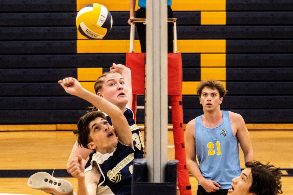 Salesianum School readies to spike against Cape Henlopen High School during the boys volleyball game at Salesianum in Wilmington, Friday, April 14, 2023. Salesianum won 3-0.