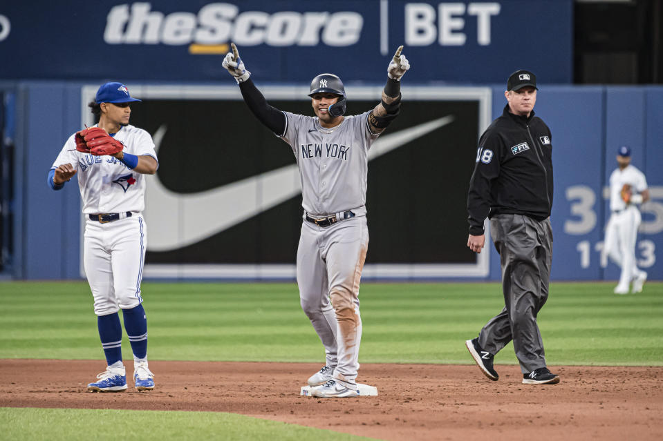 New York Yankees' Gleyber Torres celebrates after hitting a double against the Toronto Blue Jays during the fifth inning of a baseball game Friday, June 17, 2022, in Toronto. (Christopher Katsarov/The Canadian Press via AP)