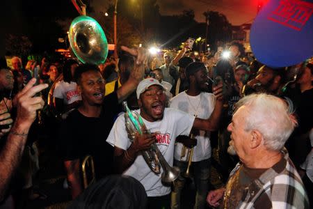 Da Truth Brass Band shows up to support a construction crew working to remove a monument of Confederate General P.G.T Beauregard at the entrance to City Park in New Orleans, Louisiana, U.S. May 17, 2017. REUTERS/Cheryl Gerber