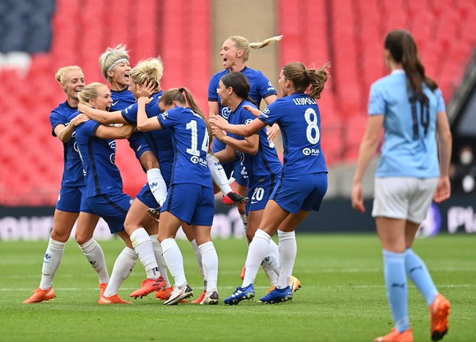 Millie Bright is surrounded by her teammates after scoring at an empty Wembley (Getty)