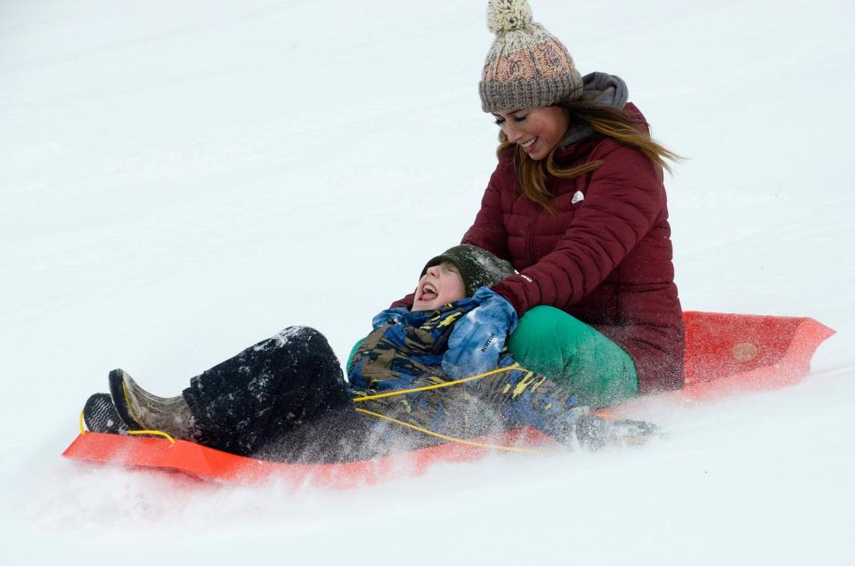 Elizabeth and Wyatt McCormack sled together on Saturday, Jan. 13, 2024 at the Winter Sports Park in Petoskey.
