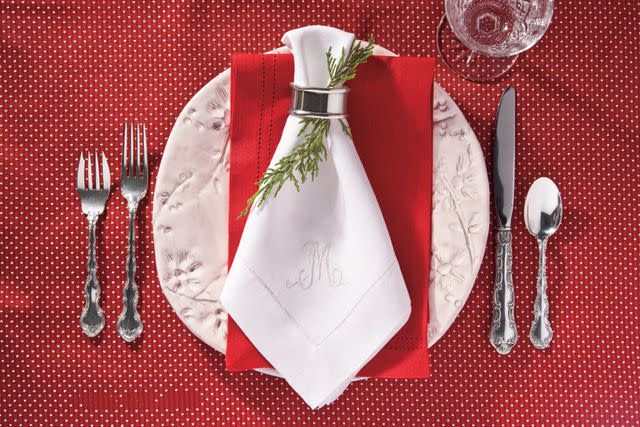 Photo by Ralph Anderson Break out the sterling and monograms, a Christmas Southern tradition. You can&#39;t miss with an elegant silver napkin ring and a sprig of greenery at your dinner.