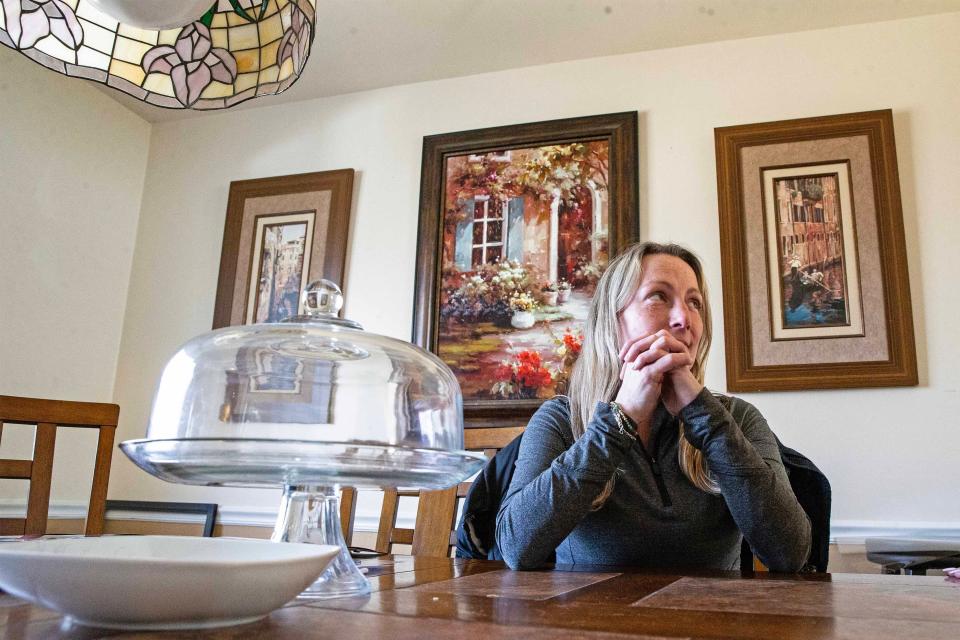 Kelly Canning, sister of missing person Charles Steele, sits in the dining room of her home in Claymont, Monday, March 11, 2024.