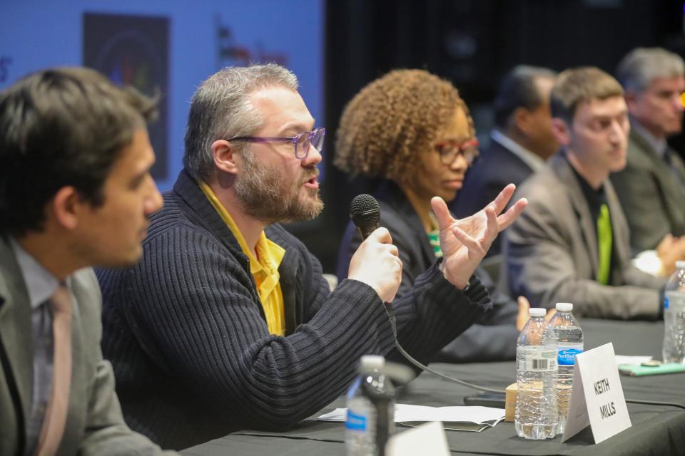 Mayoral candidate Keith Mills answers a question during the Social Justice Mayoral Forum on Thursday at Garfield CLC.