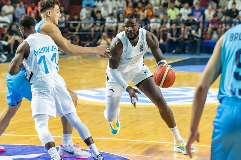 Deandre Ayton to the rim in leading Bahamas past Argentina in Olympic pre-qualifying tournament Wednesday.