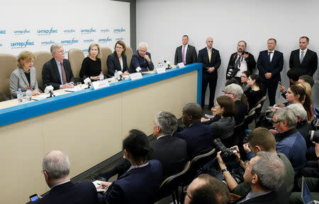 U.S. National Security Adviser John Bolton (2nd L, top) attends a news conference in Moscow, Russia October 23, 2018. REUTERS/Maxim Shemetov